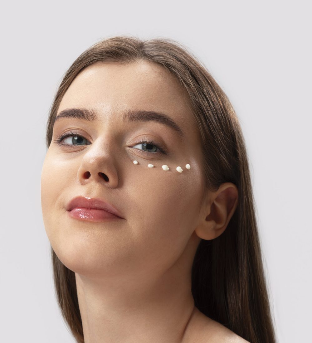 woman-using-eye-cream-side-view woman-using-eye-cream-side-view
